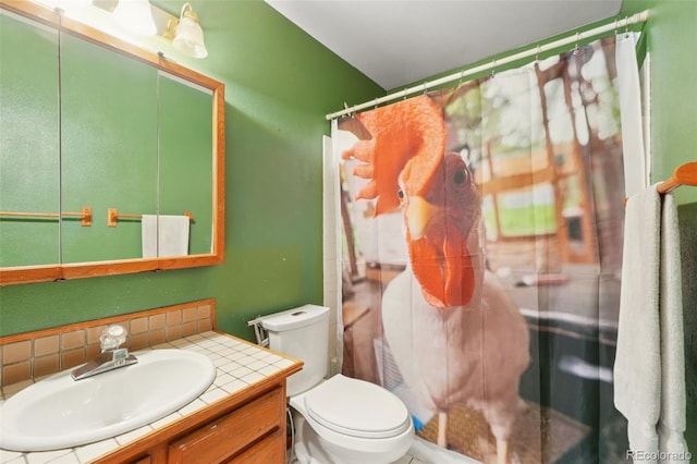 12941 S Princess Cir, Broomfield, CO 80020 - bathroom featuring a stall shower, vanity, and decorative backsplash