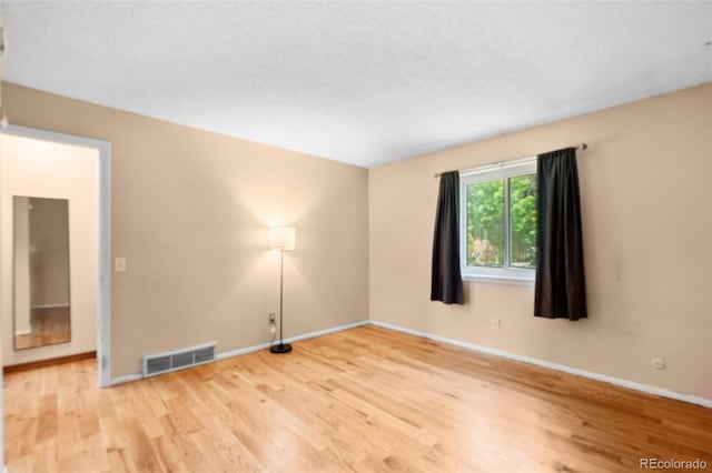 12941 S Princess Cir, Broomfield, CO 80020 - spare room with wood finished floors and baseboards