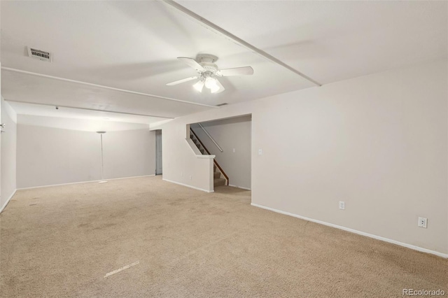 12941 S Princess Cir, Broomfield, CO 80020 - spare room with stairs, light carpet, and ceiling fan