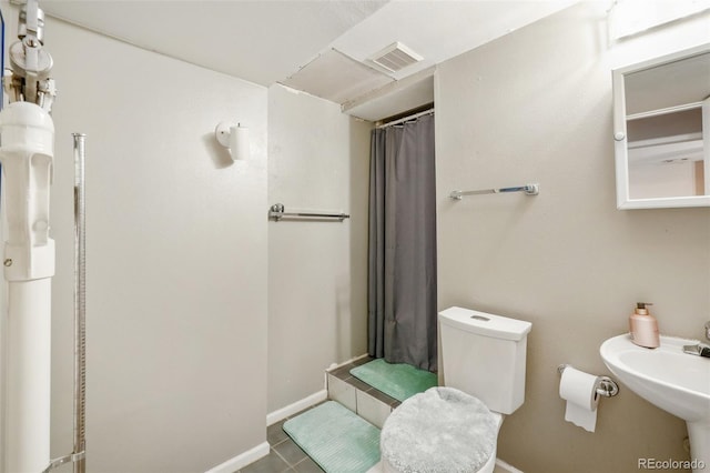 12941 S Princess Cir, Broomfield, CO 80020 - full bathroom featuring curtained shower and tile patterned floors