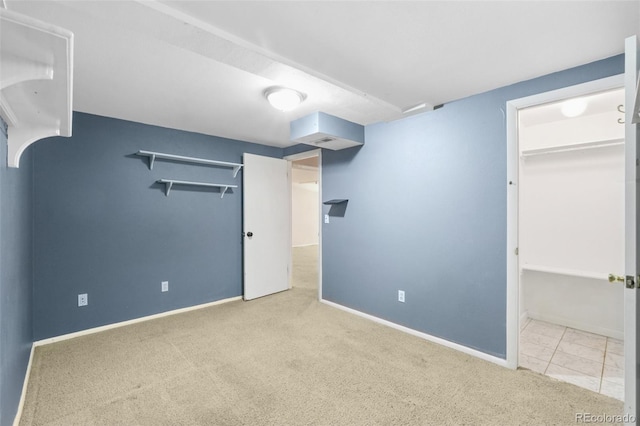 12941 S Princess Cir, Broomfield, CO 80020 - unfurnished bedroom featuring carpet flooring and a walk in closet