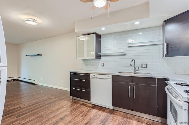 kitchen featuring dark hardwood / wood-style floors, a baseboard heating unit, sink, dark brown cabinetry, and white appliances