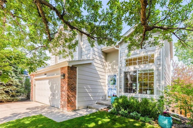 15963 Rock Crystal Dr, Parker, CO 80134 - view of side of home with an attached garage, driveway, and a yard