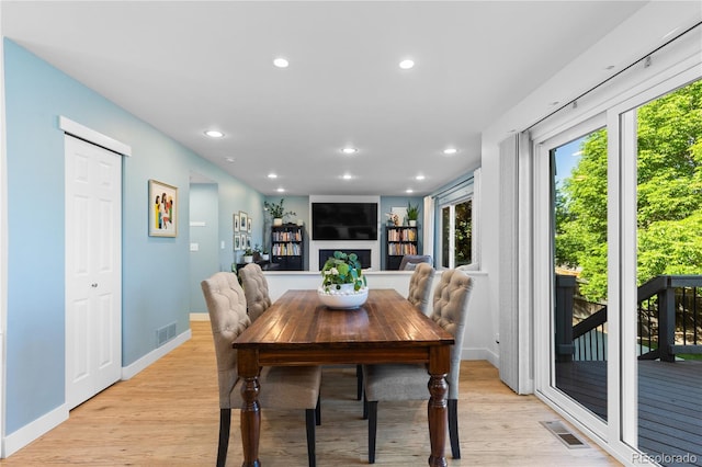 15963 Rock Crystal Dr, Parker, CO 80134 - dining room with plenty of natural light, recessed lighting, light wood-style floors, and baseboards