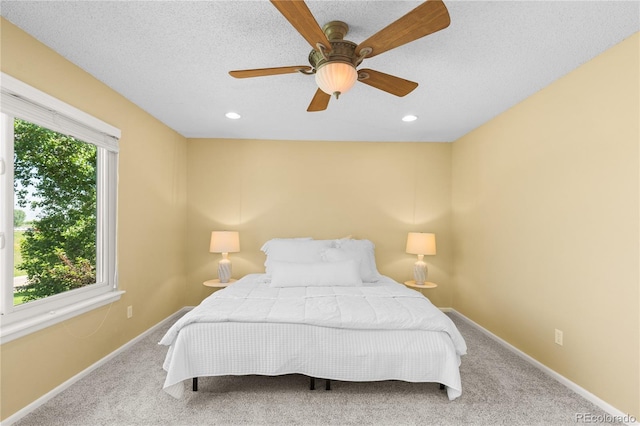 15963 Rock Crystal Dr, Parker, CO 80134 - carpeted bedroom with baseboards, a ceiling fan, and recessed lighting