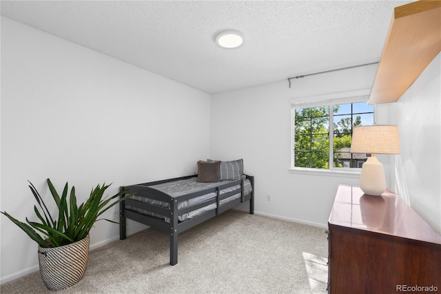 15963 Rock Crystal Dr, Parker, CO 80134 - bedroom featuring carpet flooring, a textured ceiling, and baseboards