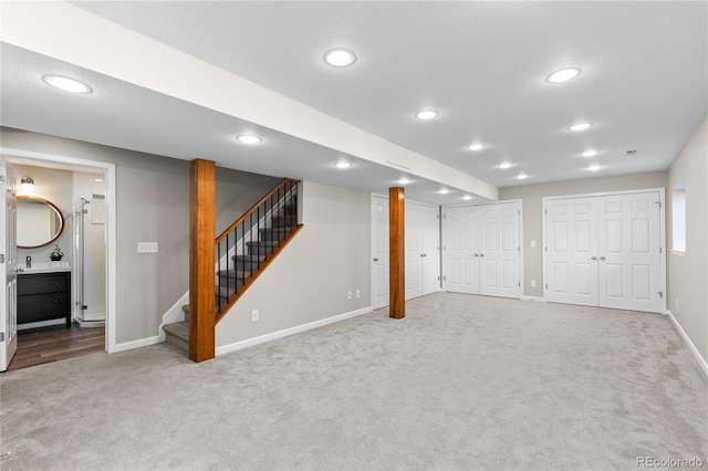 15963 Rock Crystal Dr, Parker, CO 80134 - finished basement with carpet floors, baseboards, recessed lighting, and stairs