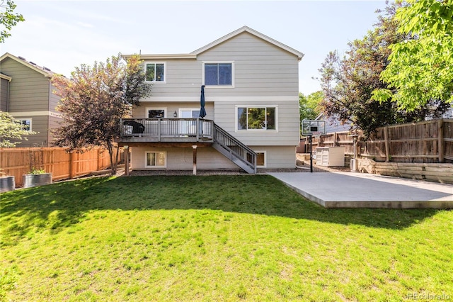 15963 Rock Crystal Dr, Parker, CO 80134 - rear view of house featuring stairs, a wooden deck, and a patio area
