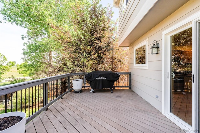 15963 Rock Crystal Dr, Parker, CO 80134 - wooden terrace with a grill