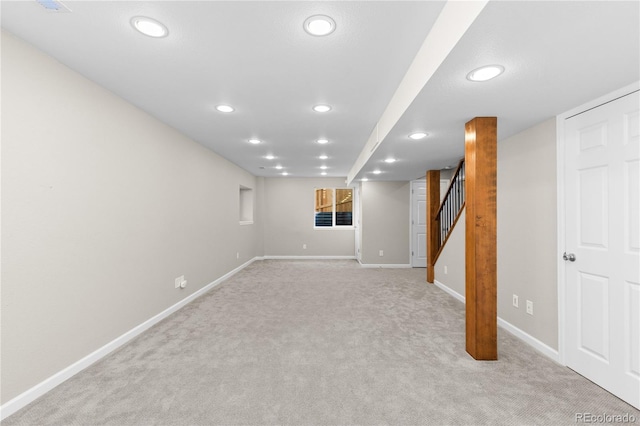 15963 Rock Crystal Dr, Parker, CO 80134 - finished basement featuring recessed lighting, light colored carpet, baseboards, and stairway