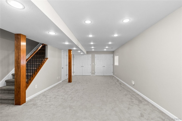 15963 Rock Crystal Dr, Parker, CO 80134 - finished below grade area featuring baseboards, carpet, recessed lighting, and stairway