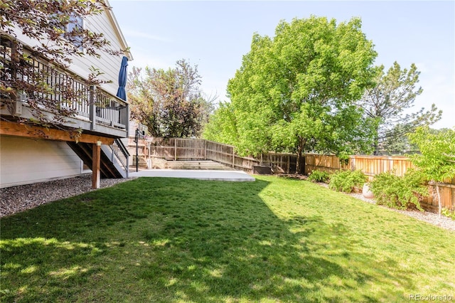 15963 Rock Crystal Dr, Parker, CO 80134 - view of yard featuring a wooden deck and stairs