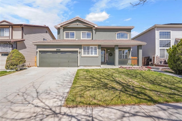 19731 E 40th Ave, Denver, CO 80249 - traditional-style home featuring stucco siding, driveway, covered porch, a front yard, and a tile roof