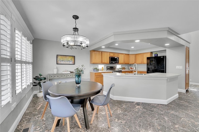 19731 E 40th Ave, Denver, CO 80249 - dining room with a chandelier, recessed lighting, and a raised ceiling