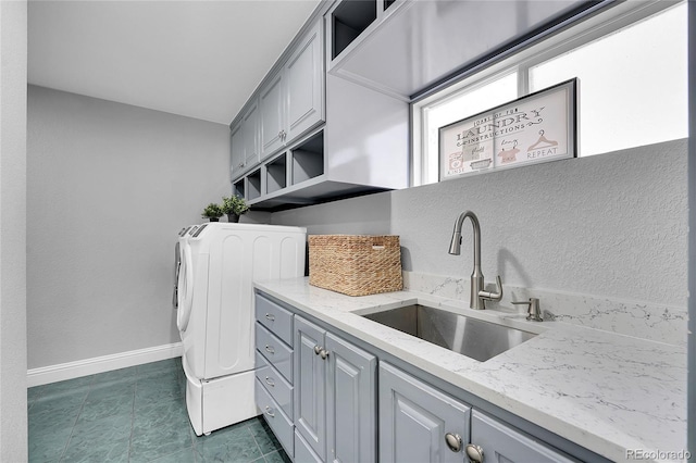 19731 E 40th Ave, Denver, CO 80249 - laundry area with cabinet space and washer and dryer