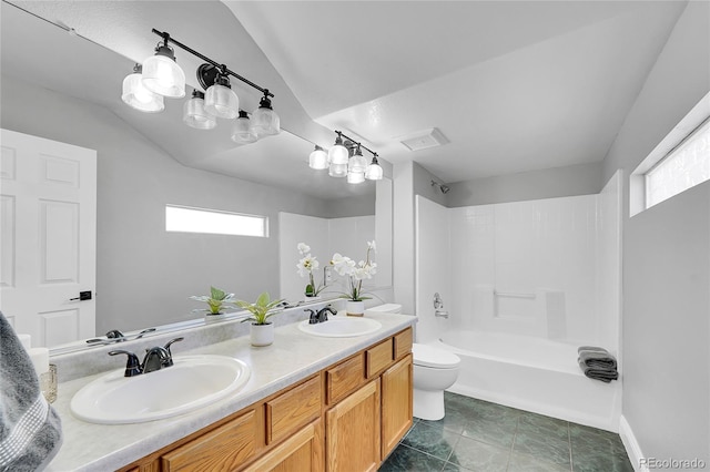 19731 E 40th Ave, Denver, CO 80249 - full bath featuring plenty of natural light, double vanity, and bathtub / shower combination