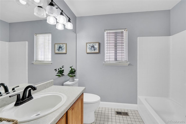 19731 E 40th Ave, Denver, CO 80249 - full bath with vanity, tile patterned floors, and bathing tub / shower combination