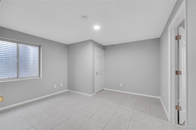 19731 E 40th Ave, Denver, CO 80249 - spare room featuring a smoke detector, light tile patterned floors, and recessed lighting