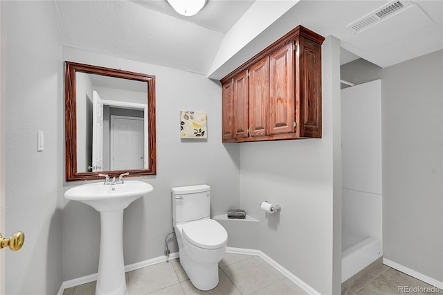 19731 E 40th Ave, Denver, CO 80249 - bathroom featuring a shower stall and tile patterned floors