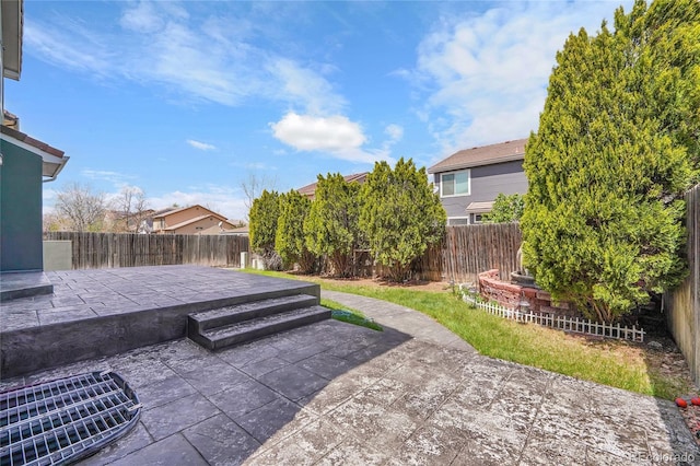 19731 E 40th Ave, Denver, CO 80249 - fenced backyard featuring a patio and a residential view