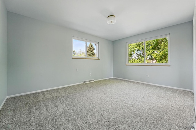 1905 S Linden Ct, Denver, CO 80224 - carpeted empty room featuring baseboards