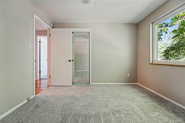 1905 S Linden Ct, Denver, CO 80224 - unfurnished bedroom with carpet flooring and a closet