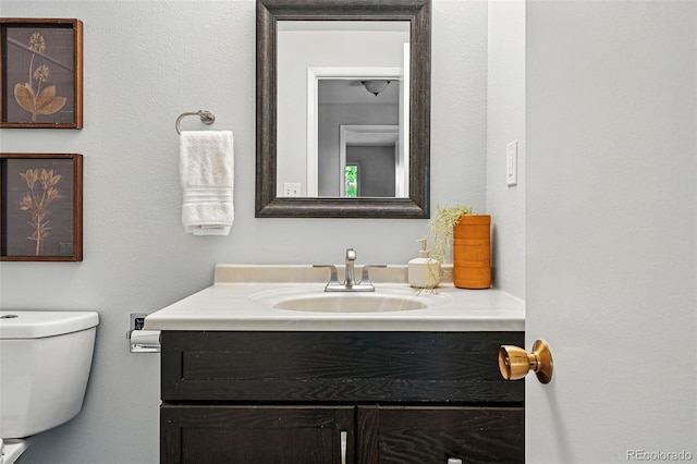 1905 S Linden Ct, Denver, CO 80224 - half bath featuring vanity and toilet