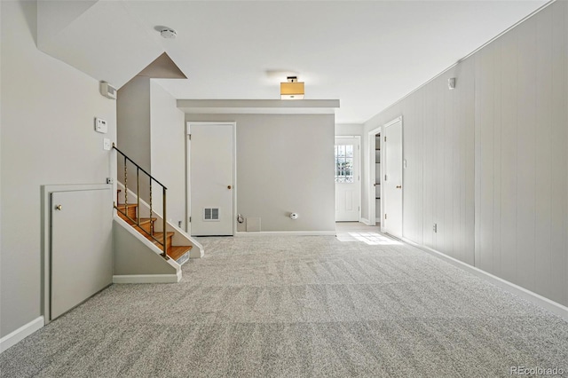 1905 S Linden Ct, Denver, CO 80224 - carpeted empty room featuring a smoke detector and stairs