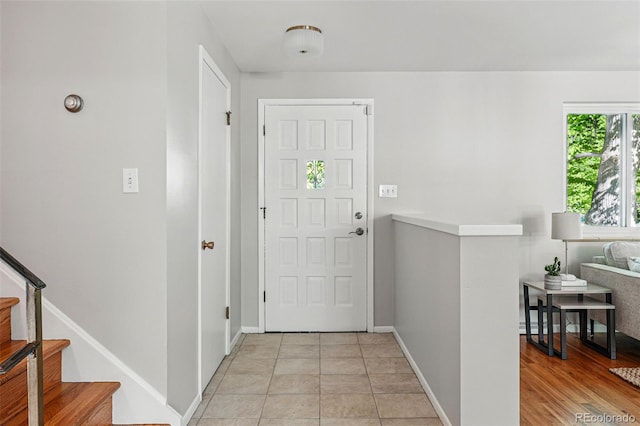 1905 S Linden Ct, Denver, CO 80224 - foyer featuring baseboards and stairs