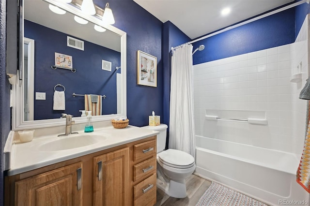 full bathroom featuring wood-type flooring, vanity, shower / bath combination with curtain, and toilet