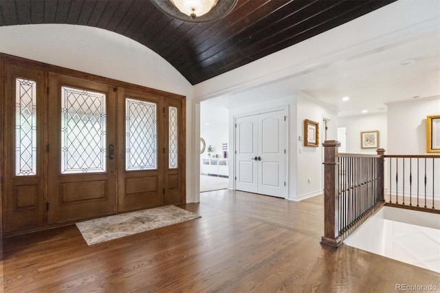 5340 S Logan Dr, Greenwood Village, CO 80121 - foyer entrance with wood finished floors, vaulted ceiling, recessed lighting, and baseboards