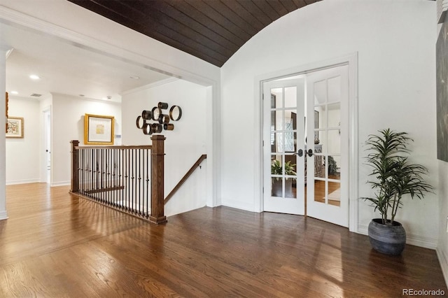 5340 S Logan Dr, Greenwood Village, CO 80121 - hall with french doors, an upstairs landing, wood finished floors, baseboards, and vaulted ceiling