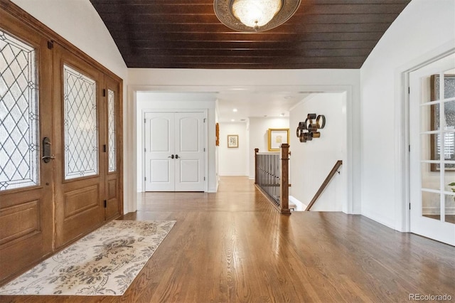 5340 S Logan Dr, Greenwood Village, CO 80121 - entryway with vaulted ceiling, baseboards, and wood finished floors