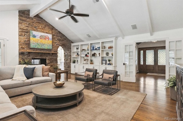 5340 S Logan Dr, Greenwood Village, CO 80121 - living room featuring wood finished floors, ceiling fan, french doors, beamed ceiling, and plenty of natural light