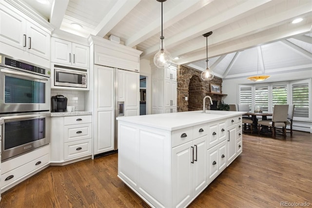 5340 S Logan Dr, Greenwood Village, CO 80121 - kitchen featuring built in appliances, light countertops, pendant lighting, white cabinets, and wooden ceiling