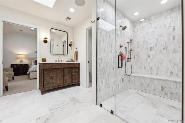 5340 S Logan Dr, Greenwood Village, CO 80121 - bathroom with a marble finish shower, vanity, toilet, ensuite bath, and marble finish flooring