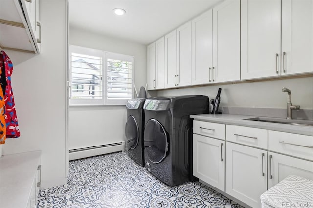 5340 S Logan Dr, Greenwood Village, CO 80121 - laundry room with a baseboard heating unit, washer and clothes dryer, recessed lighting, cabinet space, and light tile patterned floors