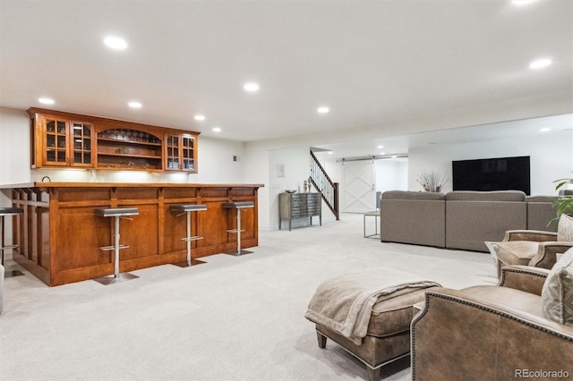 5340 S Logan Dr, Greenwood Village, CO 80121 - living area featuring recessed lighting, light colored carpet, stairway, and bar area