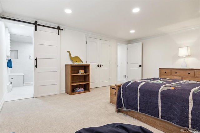 5340 S Logan Dr, Greenwood Village, CO 80121 - carpeted bedroom with recessed lighting, ornamental molding, a barn door, and ensuite bath