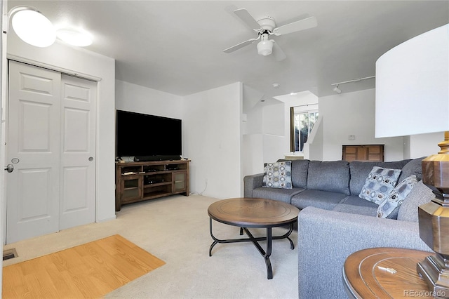 14496 E Tufts Pl Unit C, Aurora, CO 80015 - living area with a ceiling fan and light carpet