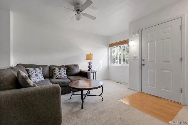 14496 E Tufts Pl Unit C, Aurora, CO 80015 - living room featuring a ceiling fan and light carpet