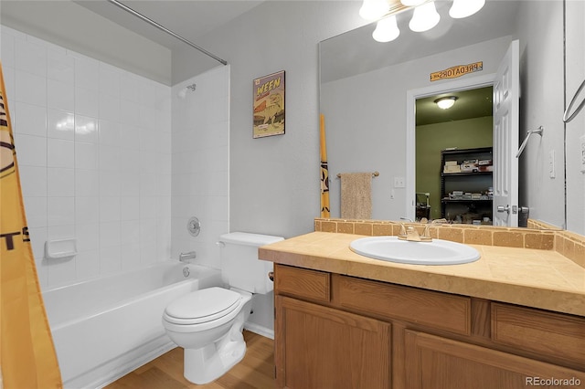 14496 E Tufts Pl Unit C, Aurora, CO 80015 - full bath featuring vanity, wood finished floors, and shower / tub combo with curtain