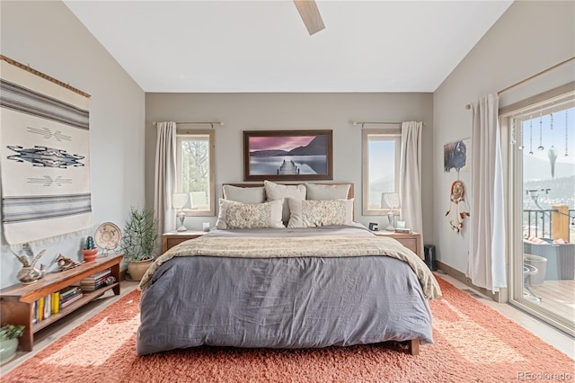 505 Rd P69, Bailey, CO 80421 - bedroom with access to outside, a ceiling fan, and vaulted ceiling