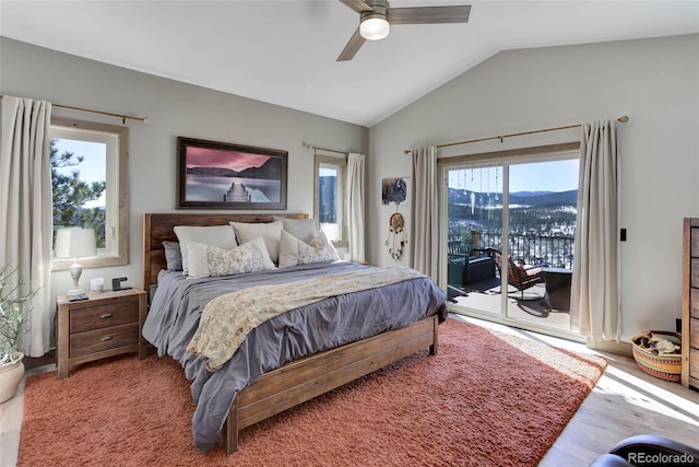 505 Rd P69, Bailey, CO 80421 - bedroom with access to exterior, lofted ceiling, wood finished floors, and ceiling fan