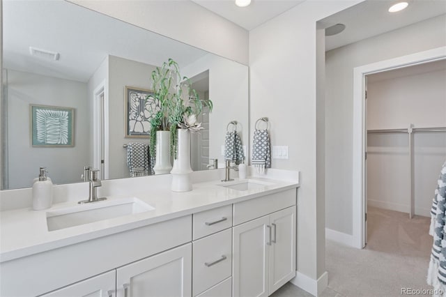 13334 Blue Amber Ct, Parker, CO 80134 - full bathroom featuring double vanity, recessed lighting, and a walk in closet