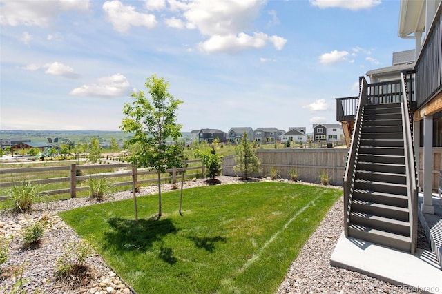 13334 Blue Amber Ct, Parker, CO 80134 - fenced backyard with stairway, a residential view, and a wooden deck