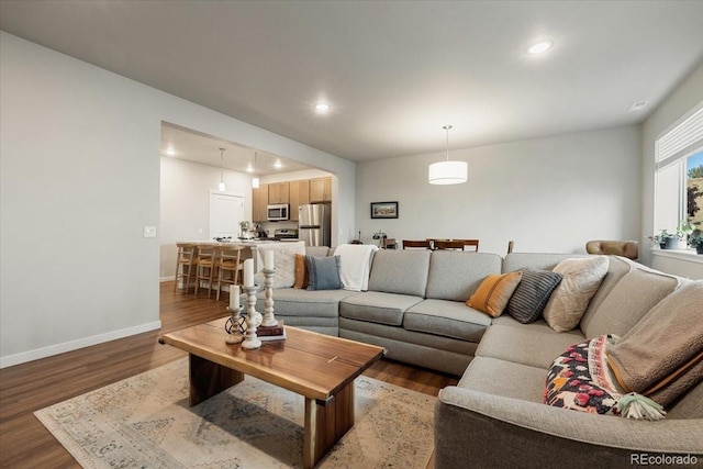 living room featuring dark hardwood / wood-style floors