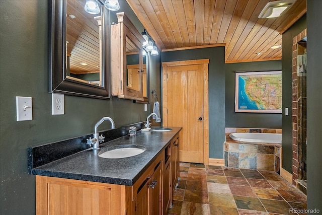 bathroom with crown molding, wooden ceiling, a relaxing tiled tub, and vanity