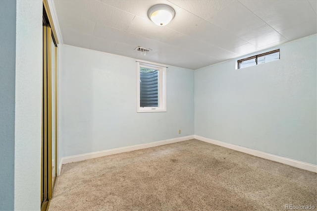 8137 Vanguard Dr, Denver, CO 80221 - spare room featuring carpet and baseboards