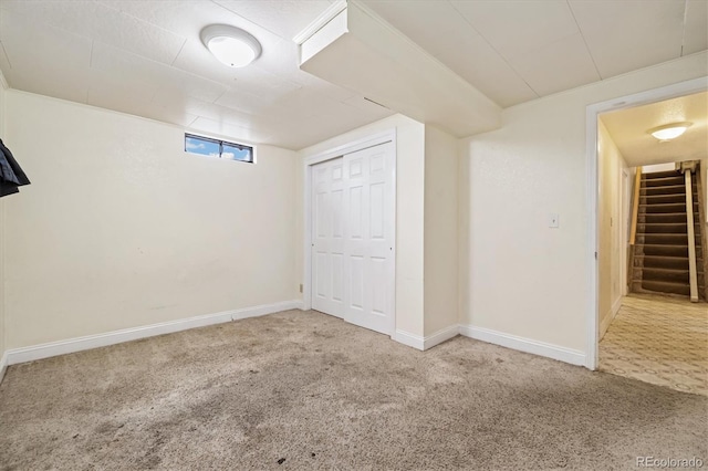 8137 Vanguard Dr, Denver, CO 80221 - below grade area featuring carpet flooring, stairway, and baseboards